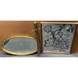 A vintage UK map mirror and an oval gilt mirror, map size 56 x 72cm, together with a cutlass.