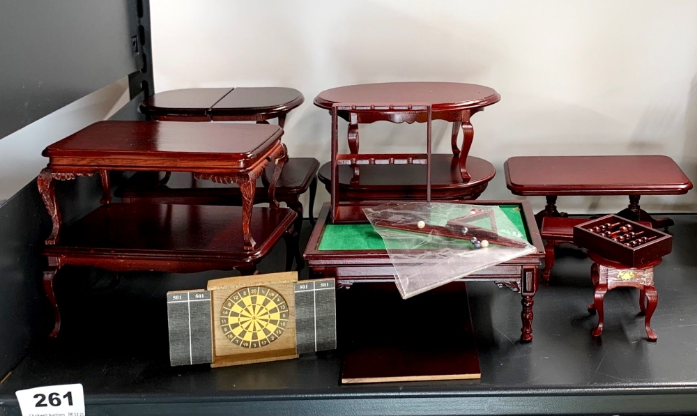 A quantity of dolls house wooden tables, including a snooker table and components and a darts