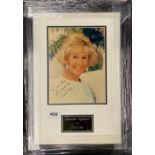 Autograph interest: Framed autograph of Doris Day (American, April 1922- May 2019). Authenticated by
