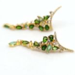 A pair of 925 silver gilt drop earrings set with chrome diopsides, emeralds and white stones, L.