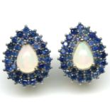 A pair of 925 silver earrings set with cabochon cut opal and two rows of sapphires, L. 2cm.