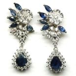 A pair of 925 silver drop earrings set with sapphires and white stones, L. 3cm.