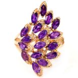 A 925 silver rose gold gilt ring set with marquise cut amethysts, (O).