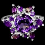 A 925 silver large cluster ring set with amethysts, (Q), Dia. 2cm.