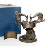 A WORKING BRONZE MINIATURE REPLICA OF THE 1977 SILVER JUBILEE DOLPHIN SUNDIAL LOCATED AT THE