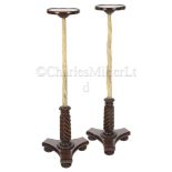 Ø A FINE PAIR OF WILLIAM IV NARWHAL TORCHÈRE STANDS