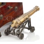 A BRASS MODEL OF A NAVAL GUN, POSSIBLY 19TH CENTURY