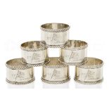 A SET OF SIX VICTORIAN SILVER NAPKIN RINGS FROM THE STEAM YACHT LATHARNA
