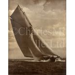 AN IMPRESSIVE SEPIA TONE PHOTOGRAPHIC PRINT BY BEKEN OF COWES OF THE RACING YACHT 'MOHAWK' RACING