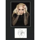 Gwen Stefani signature piece mounted below colour photo, Approx overall size 16x12. We combine