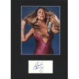 Mariah Carey signature piece mounted below colour photo. Approx overall size 16x12. We combine