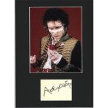 Adam Ant signature piece mounted below colour photo. Approx overall size 16x12. We combine postage