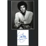 Tom Jones signature piece mounted below black and white photo. We combine postage on multiple