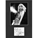 Lady Gaga signature piece mounted below black and white photo of the singer. Approx overall size