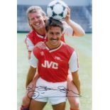 Autographed KENNY SANSOM 12 x 8 photo - Col, depicting the Arsenal captain posing with midfielder