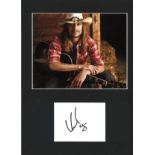 Kid Rock signature piece mounted below colour photo. Approx overall size 16x12. We combine postage