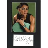 Nelly Furtado signature piece, mounted below colour photo. Approx overall size 16x12. We combine