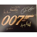 James Bond 007, lovely 14x11 inch photo signed by SEVEN actors who have appeared in a Bond movie