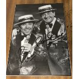 Ronnie Barker and Ronnie Corbett signed 7 x 5 inch b/w magazine photo.