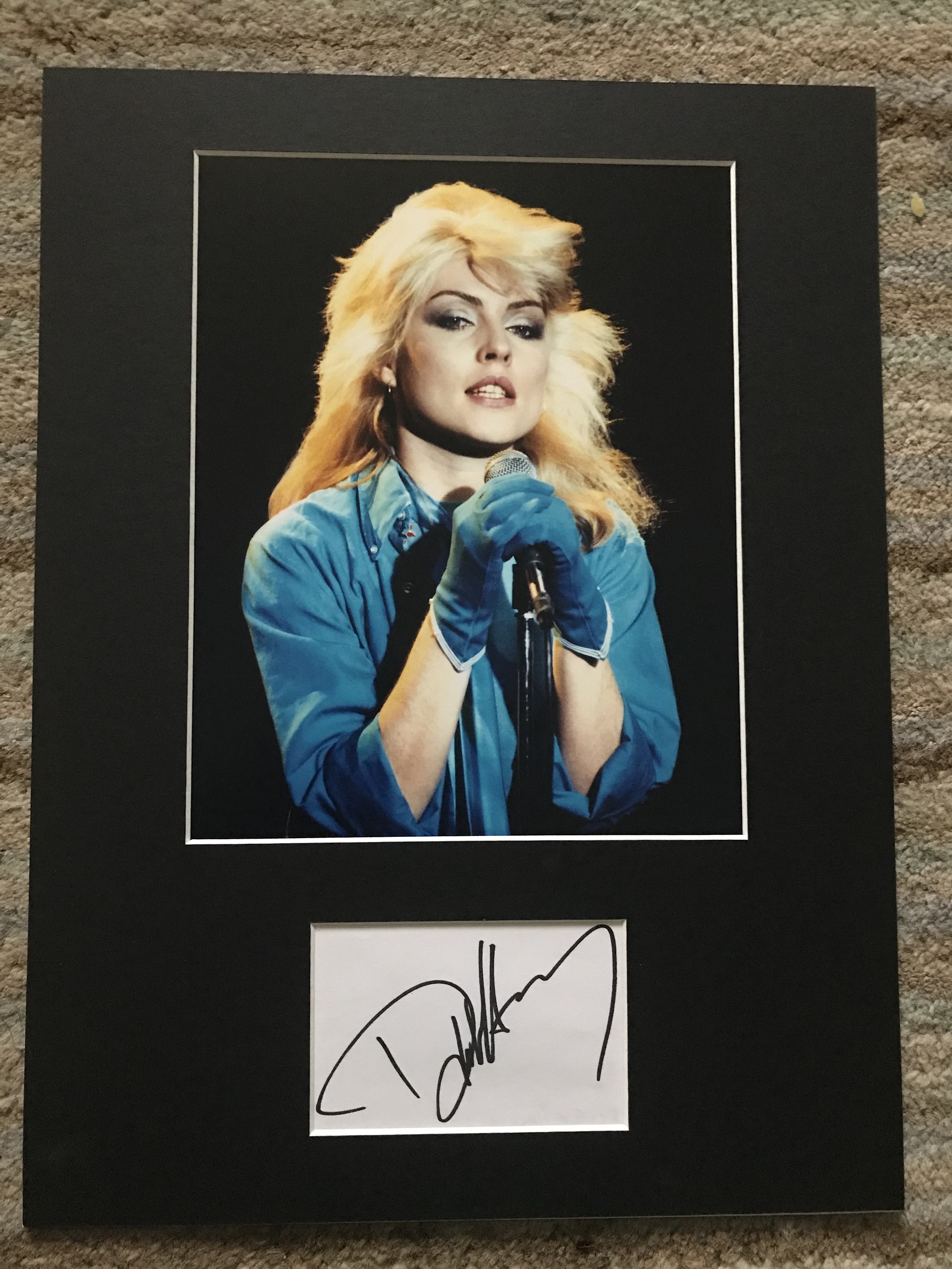 Debbie Harry autograph mounted with 10 x 8 inch colour photo to an overall size 16 x 12 inches.