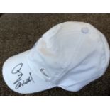 Tennis Rafa Nadal personally signed cap with photo of him autographing the item. Condition 9/10. All