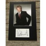 Rod Stewart autograph mounted with 10 x 8 inch colour photo to an overall size 16 x 12 inches.