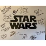 Star Wars 14x11 inch photo signed by THIRTEEN actors who have appeared in a Star Wars movie