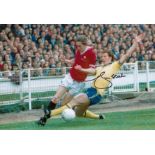 Autographed JIM STEELE 12 x 8 photo - Col, depicting Man United's Gerry Daly trying to get past a