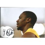 Olympics Yohan Blake signed 6x4 colour photo of the Double Gold Medallist in the Mens 4x100 relay at