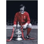 Autographed TOMMY SMITH 16 x 12 photo - Colorized, depicting the Liverpool right-back posing with