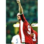 Football John Hartson signed 16x12 colour photo pictured celebrating while playing for Wales. Good