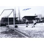 Autographed NAT LOFTHOUSE 16 x 12 photo - B/W, depicting the Bolton centre-forward beating
