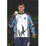 Olympics Radik Isayev signed 6x4 colour photo of the Gold Medallist in the 80kg Taekwondo event at