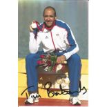 Olympics Tim Brabants signed 6x4 colour photo of the Gold and Double Bronze medallist at the 2000