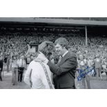 Autographed LAWRIE McMENEMEY 12 x 8 photo - B/W, depicting the Southampton manager congratulating