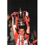 Football Bryan Robson signed 16x12 colour photo pictured lifting the FA Cup while captain of