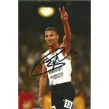 Olympics Taoufik Makhloufi signed 6x4 colour photo of the Gold and Double Silver Medallist in the