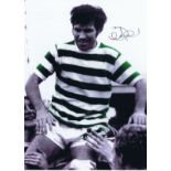 Autographed BERTIE AULD 16 x 12 photo - Colorized, depicting Auld being chaired by teammates