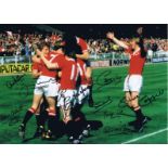 Autographed MAN UNITED 16 x 12 photo - Col, depicting players converging on STUART PEARSON who had