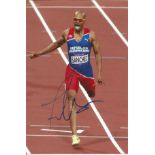 Olympics Felix Sanchez signed 6x4 colour photo of the Gold Medallist in the 400m Hurdles Event at