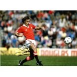 Football Sammy McIlroy signed 16x12 colour photo pictured in action for Manchester United. Good