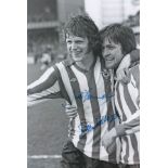 Autographed SOUTHAMPTON 12 x 8 photo - B/W, depicting MIKE CHANNON and JIM McCALLIOG, arm in arm