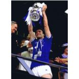 Autographed KEVIN RATCLIFFE 16 x 12 photo - Col, depicting the Everton captain holding aloft the