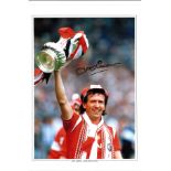 Football John Gidman signed 16x12 colour photo pictured with the FA Cup while playing for Manchester