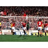 Football Gordon McQueen signed 16x12 colour photo pictured playing for Manchester United against