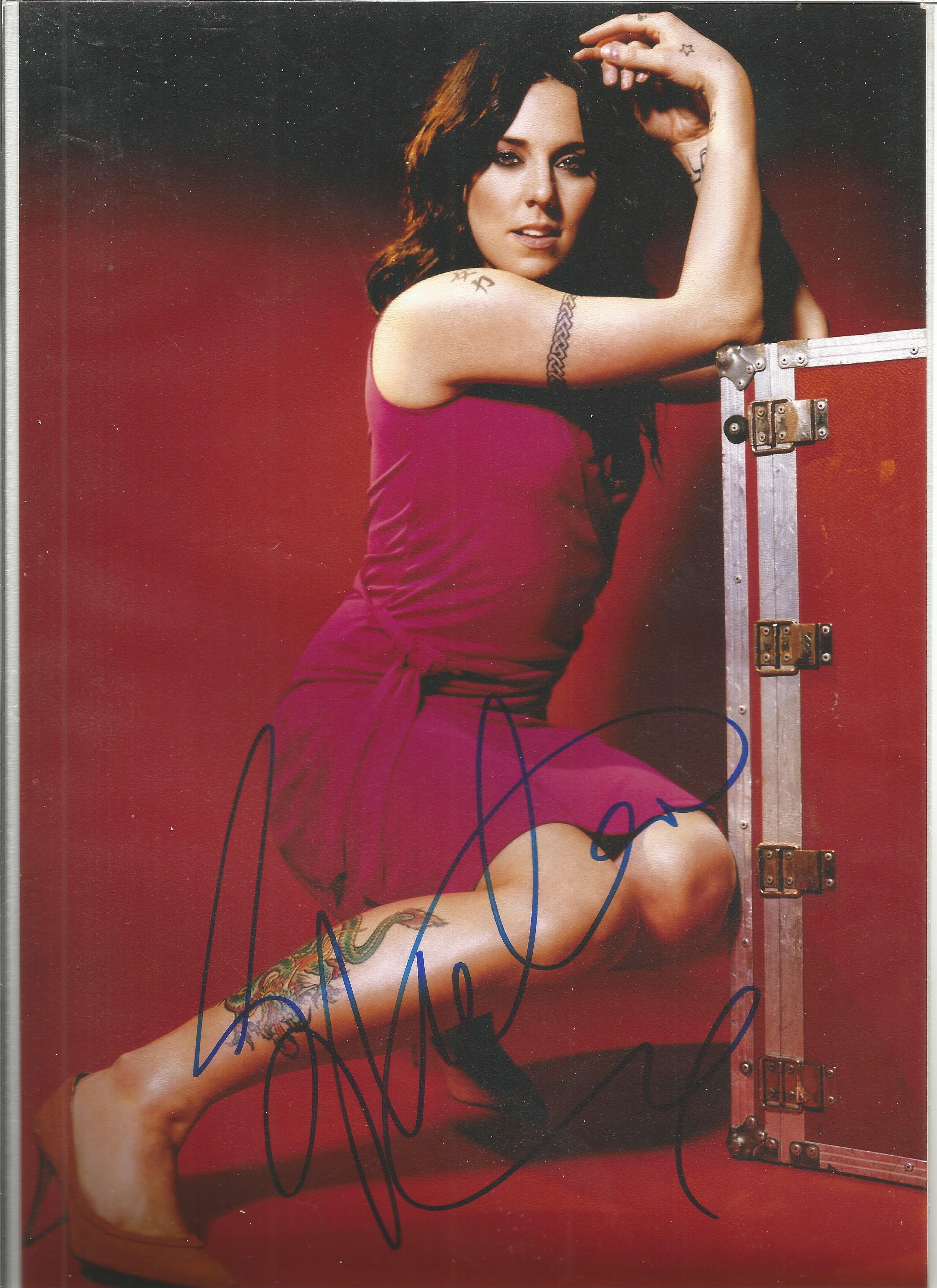 Mel C signed 12x8 colour photo. Good condition. All autographs come with a Certificate of