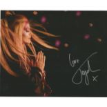 Toyah Punk Queen signed 10 x 8 inch colour photo. Good condition. All autographs come with a