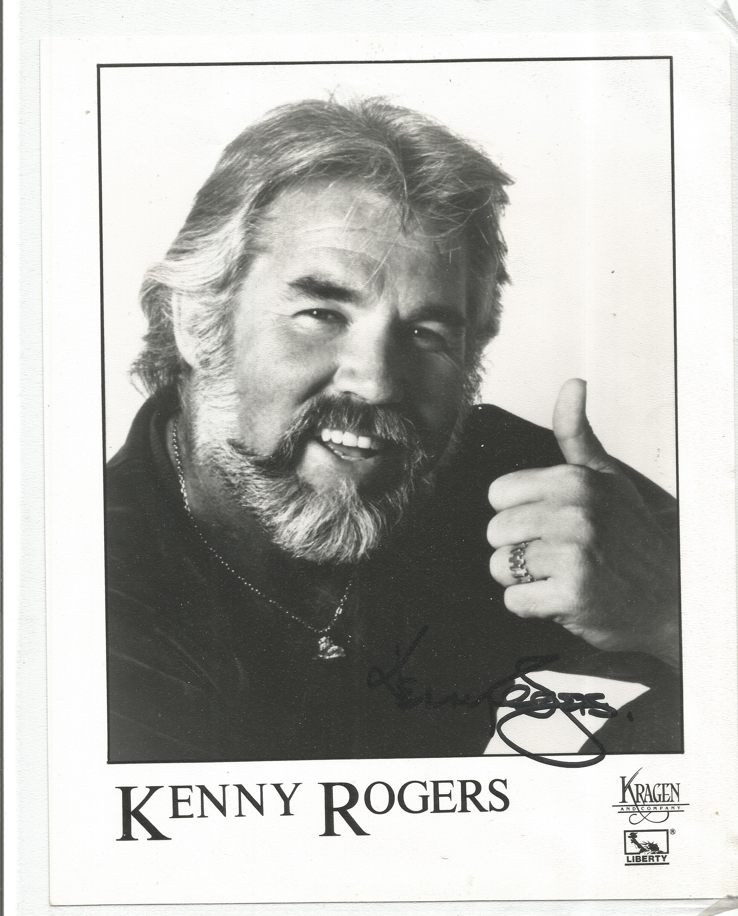 Kenny Rogers signed 10x8 black and white photo. Good condition. All autographs come with a