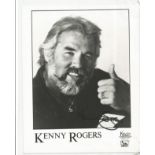 Kenny Rogers signed 10x8 black and white photo. Good condition. All autographs come with a