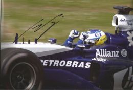 Nick Heidfeld signed 12x8 colour photo driving a BMW at the Nurburgring in 2005. During his